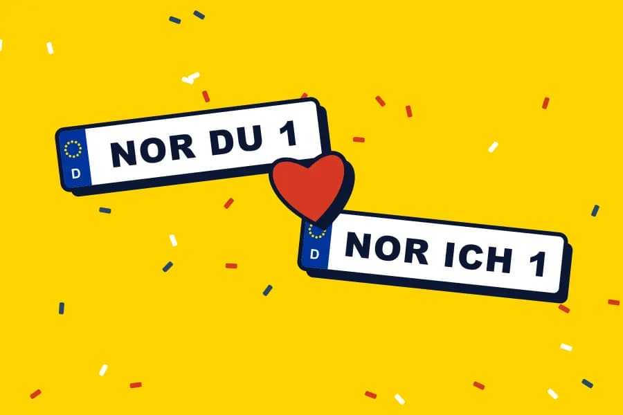 Zwei Kennzeichen mit „DU“ und „ICH“ und einem Herz
